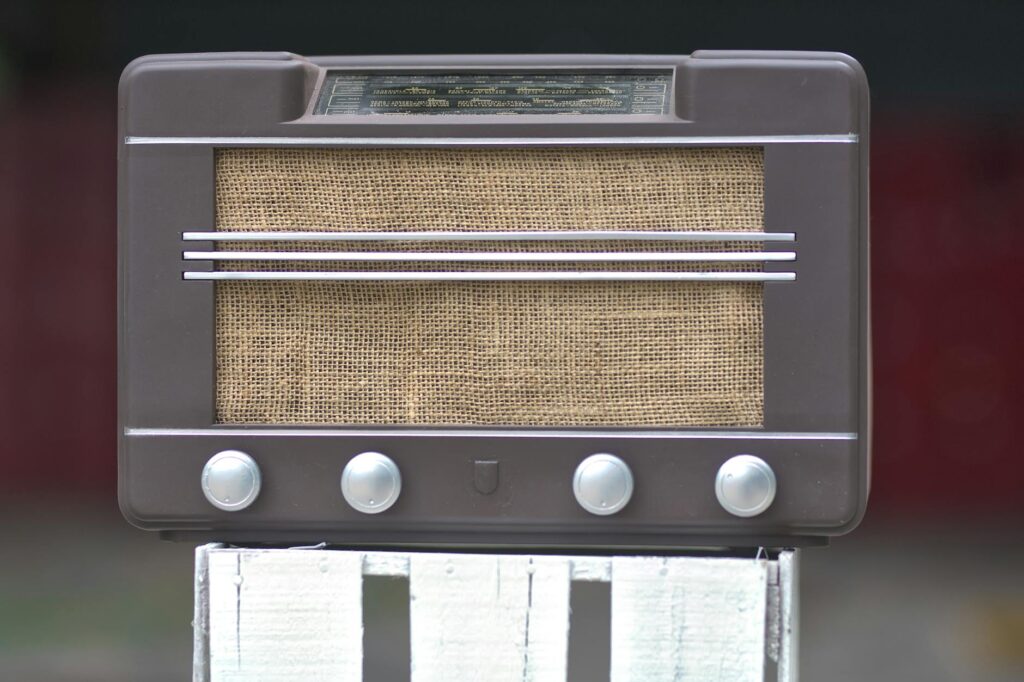 Close-up of a vintage brown radio with a retro design and classic styling.
